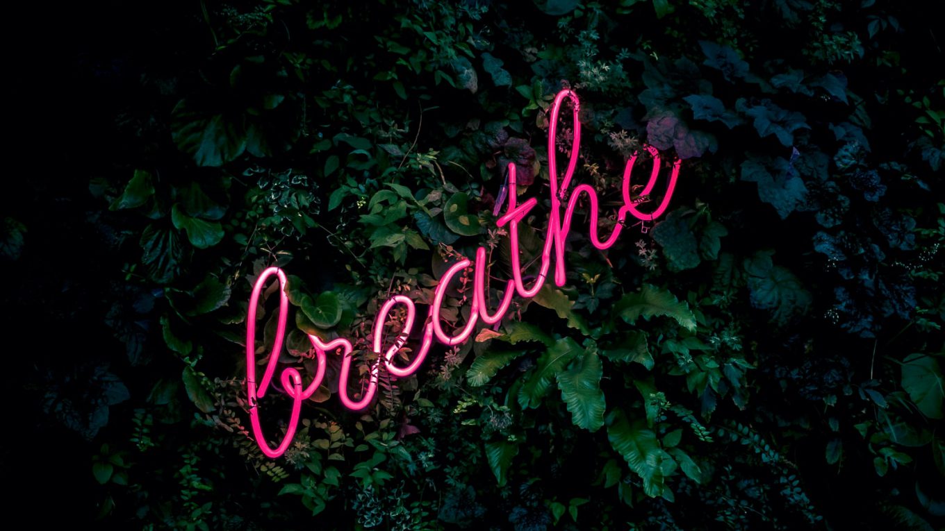 pink breathe neon sign